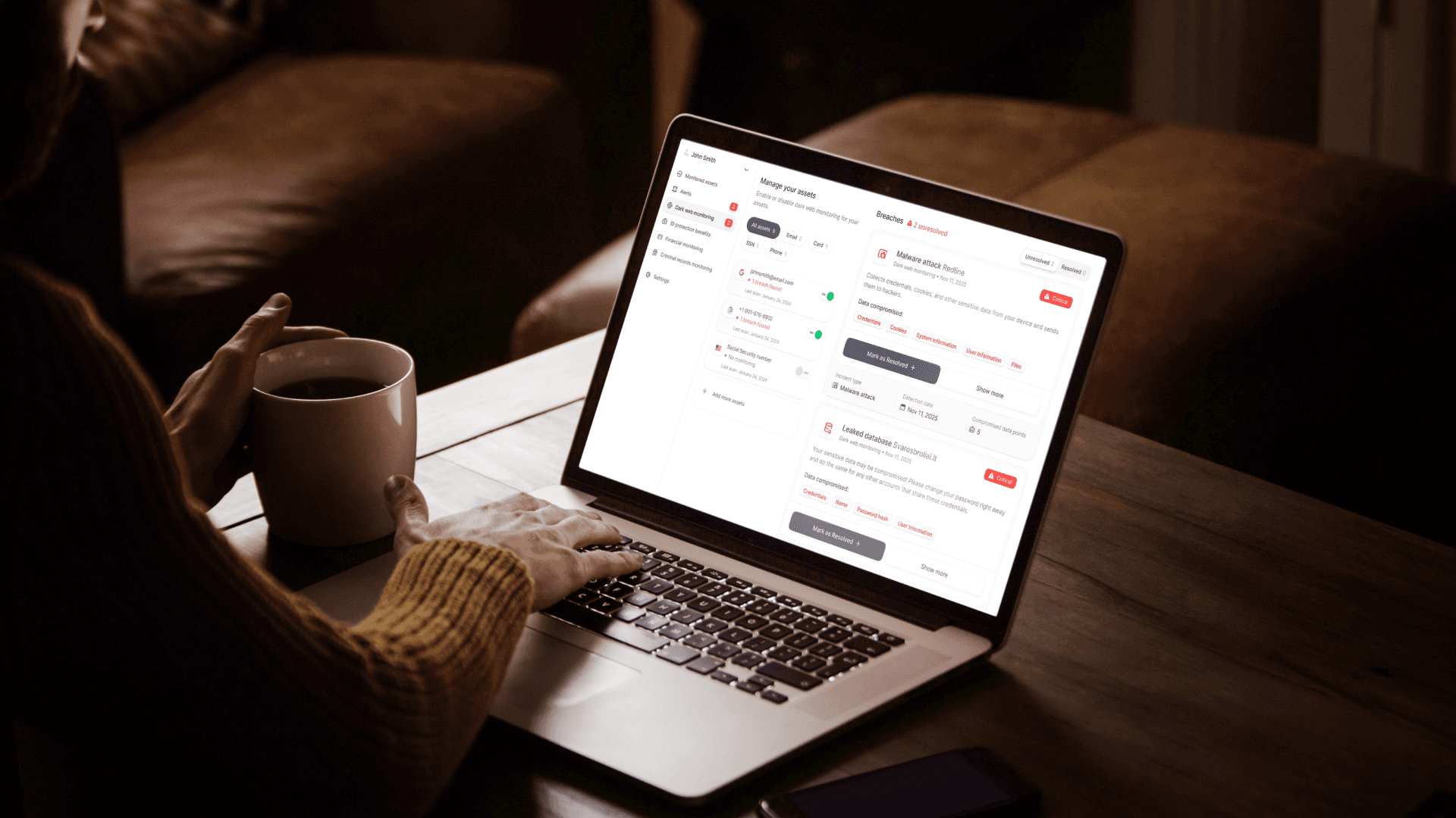 Coveron identity protection dashboard open on a laptop during an identity monitoring review